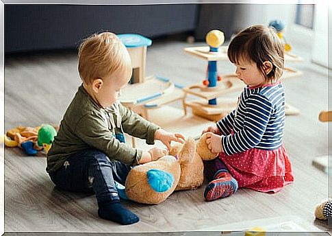 two children playing together in daycare