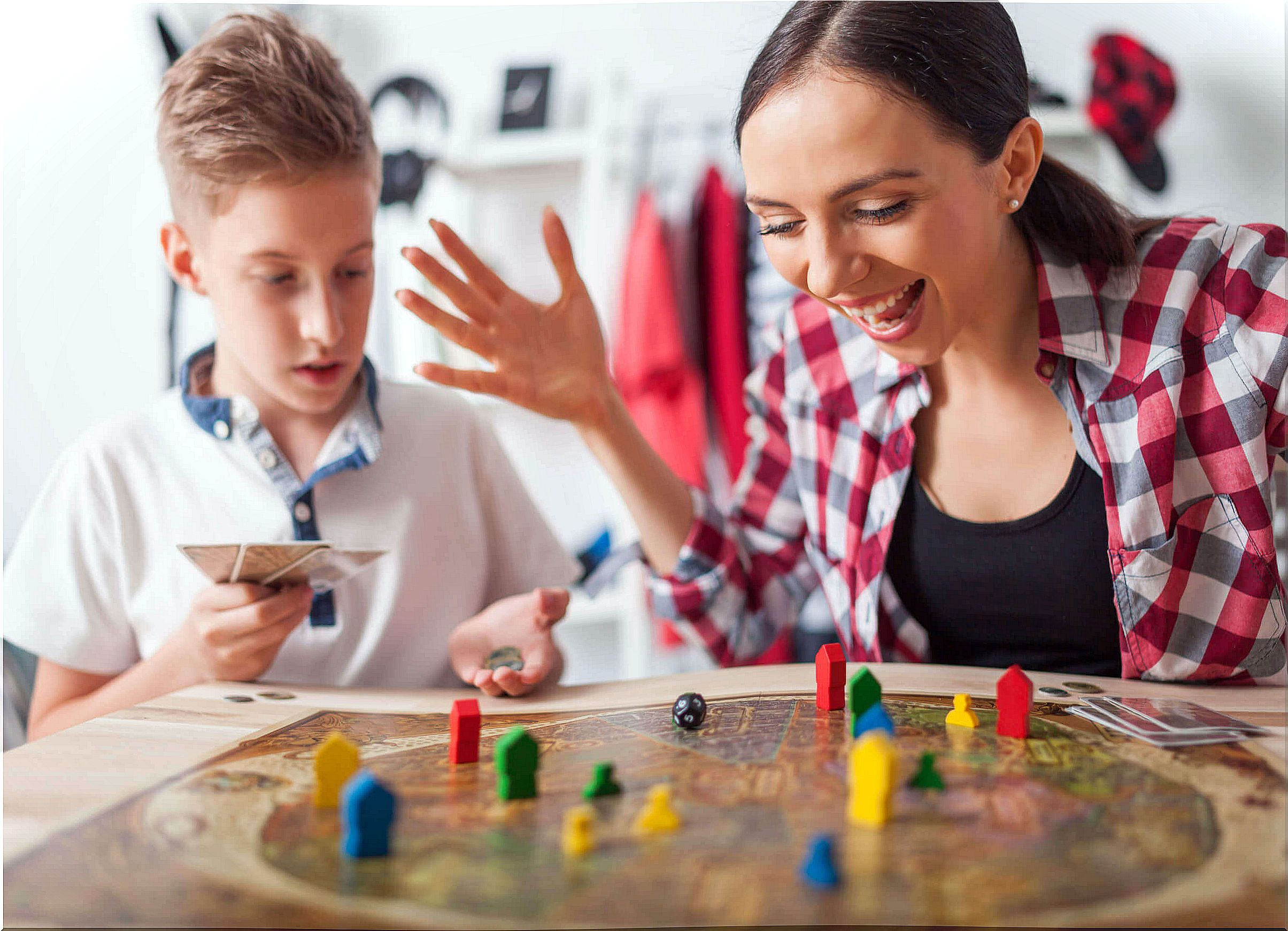 Mother and child playing collaborative games.