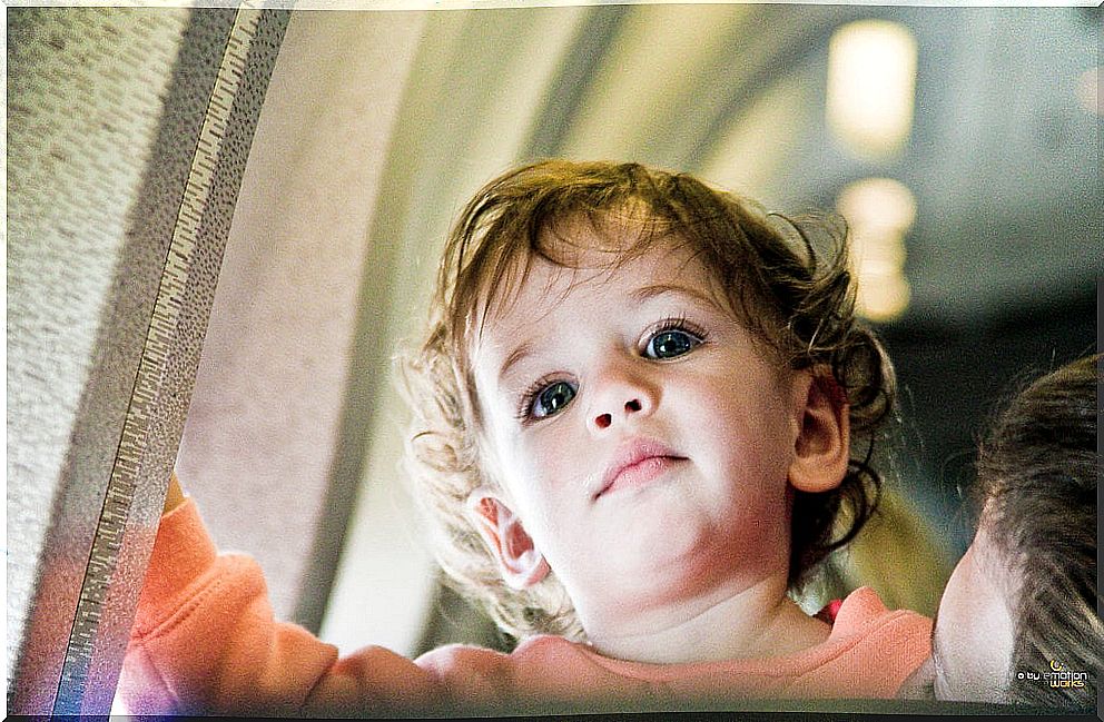 Baby inside the plane.